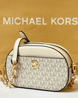 MICHAEL KORS JET SET GLAM SMALL FRONT POCKET OVAL CROSSBODY BAG MK LIGHT CREAM